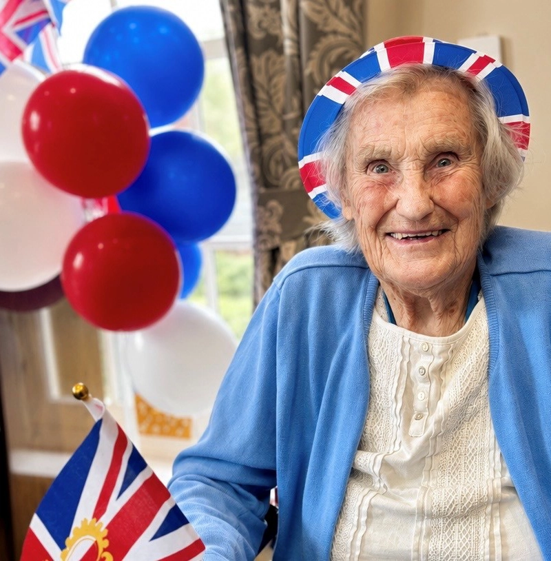 Glencairn House Care Home resident in red white and blue